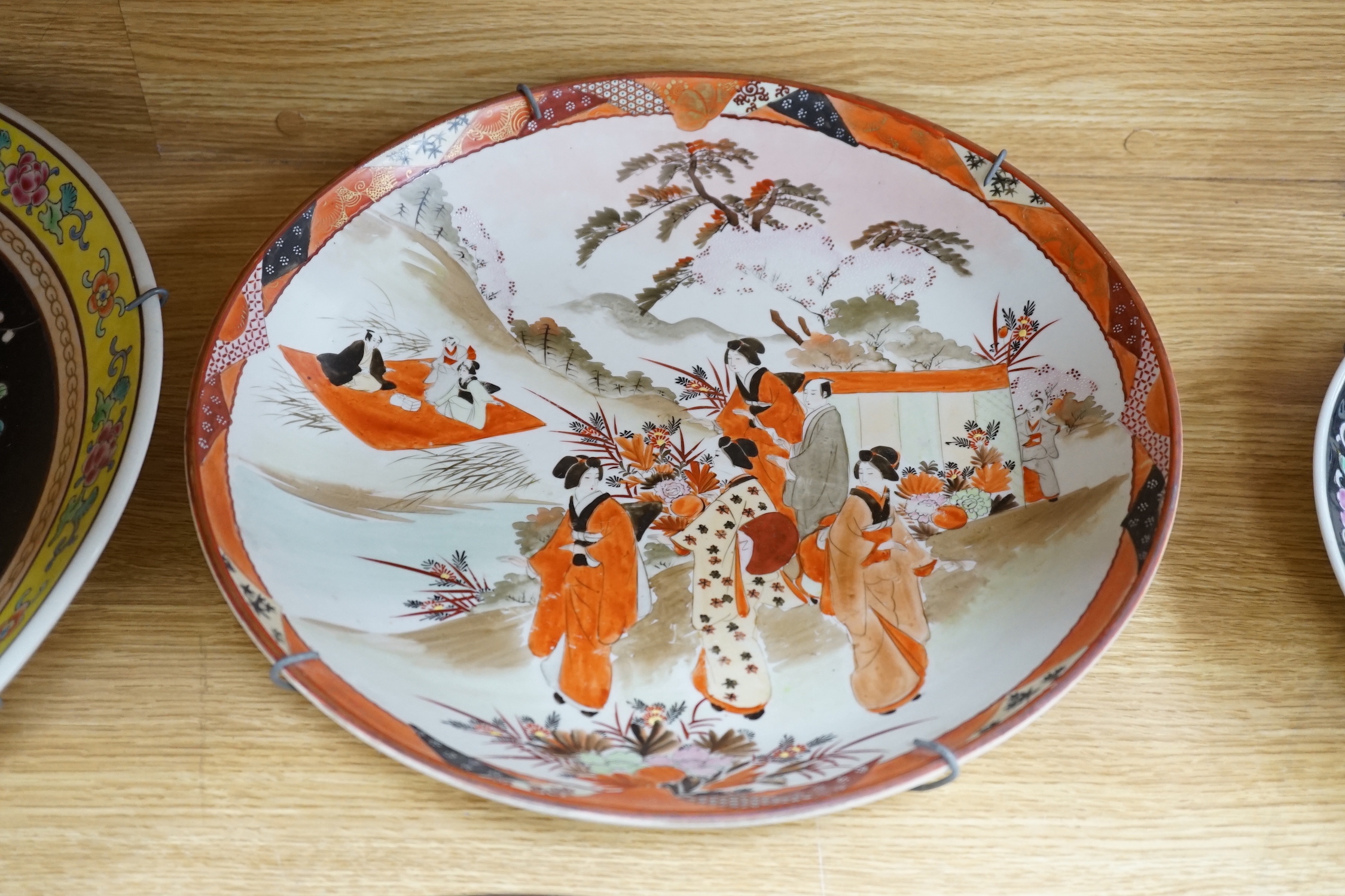 Six mixed 20th century Chinese / Japanese export chargers, largest 46cm diameter